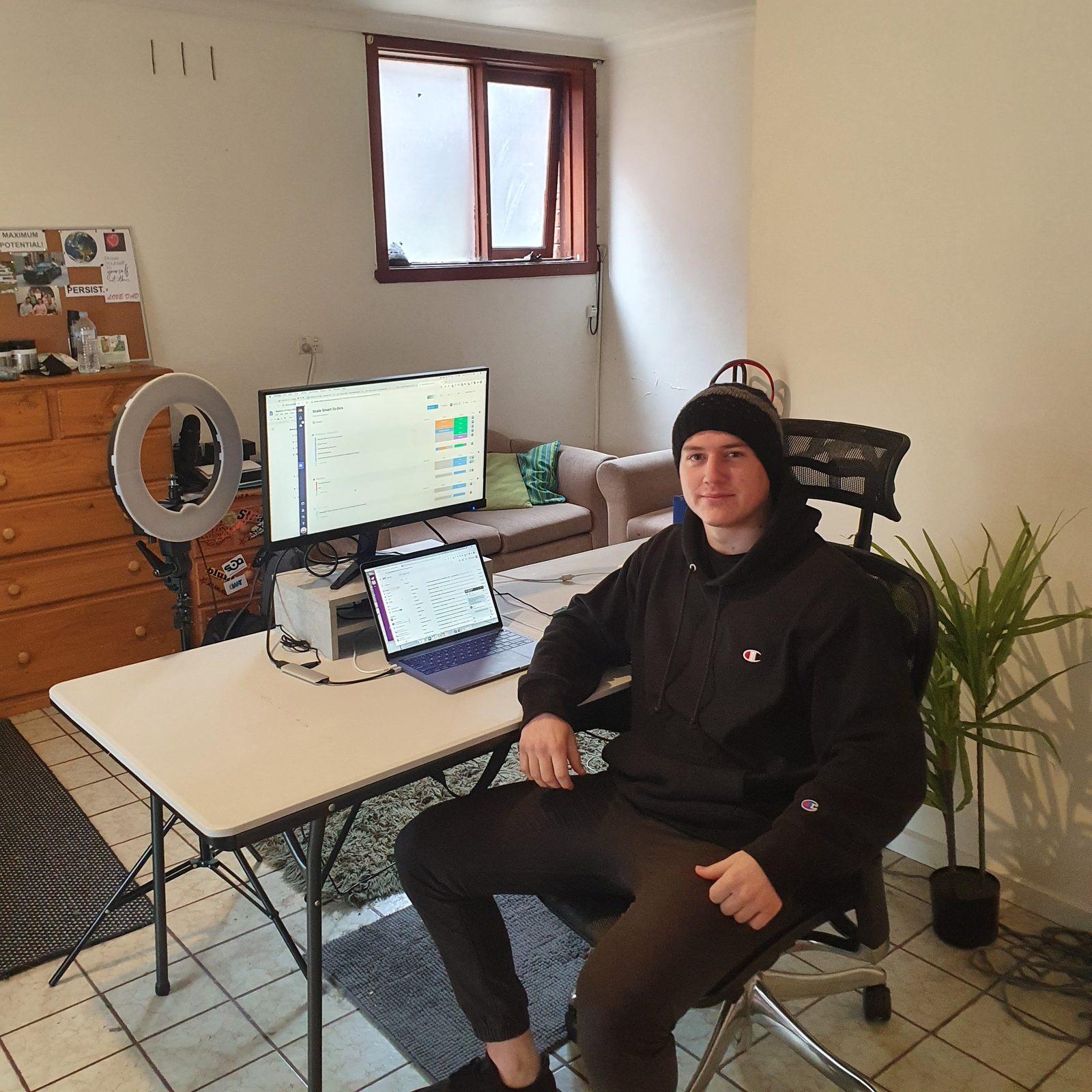 Lachie building the education business at home during lockdown