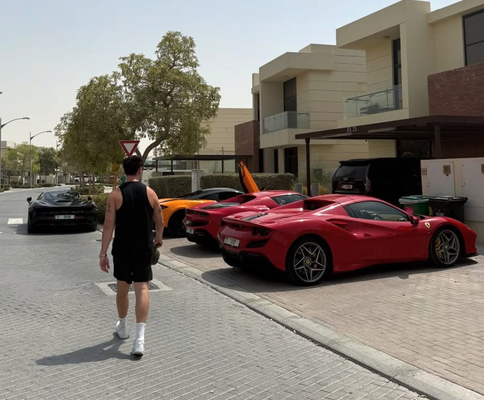 Lachie with Ferraris in Dubai
