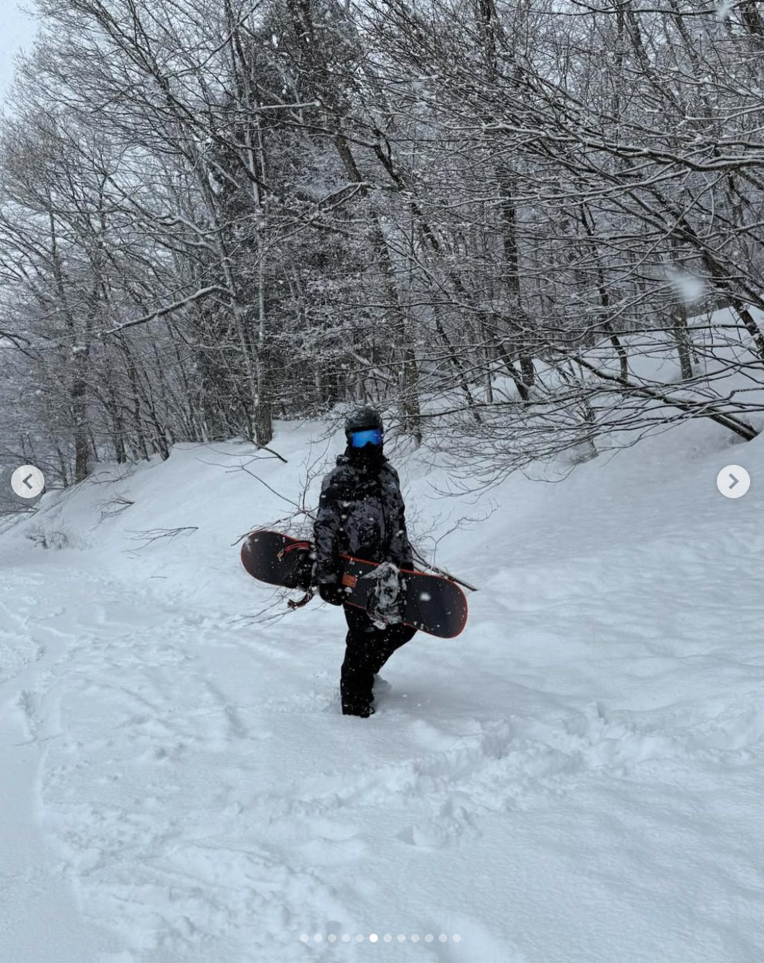 Lachie snowboarding in the Japan backcountry