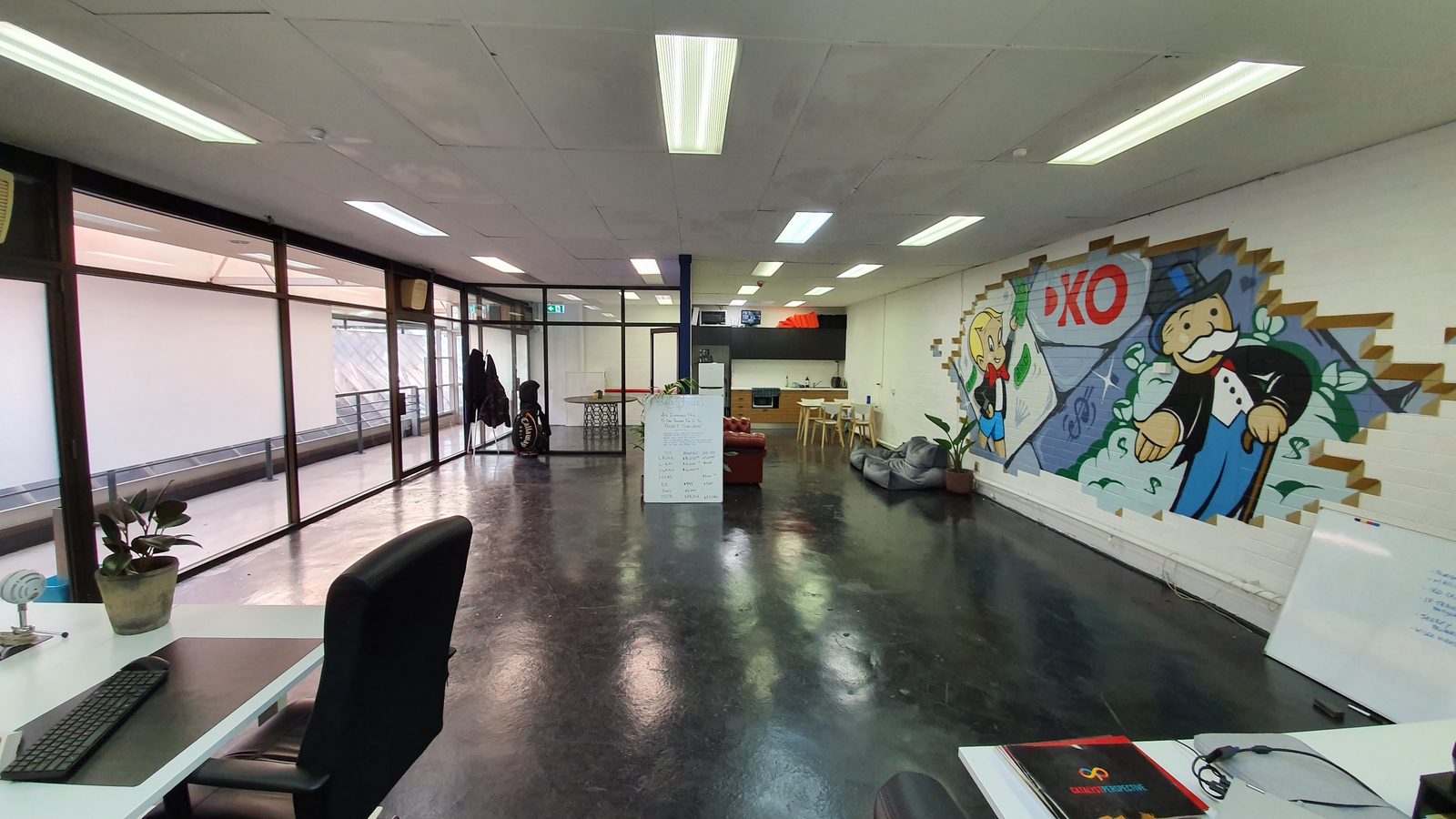 Lachie's second, bigger office with a Monopoly mural